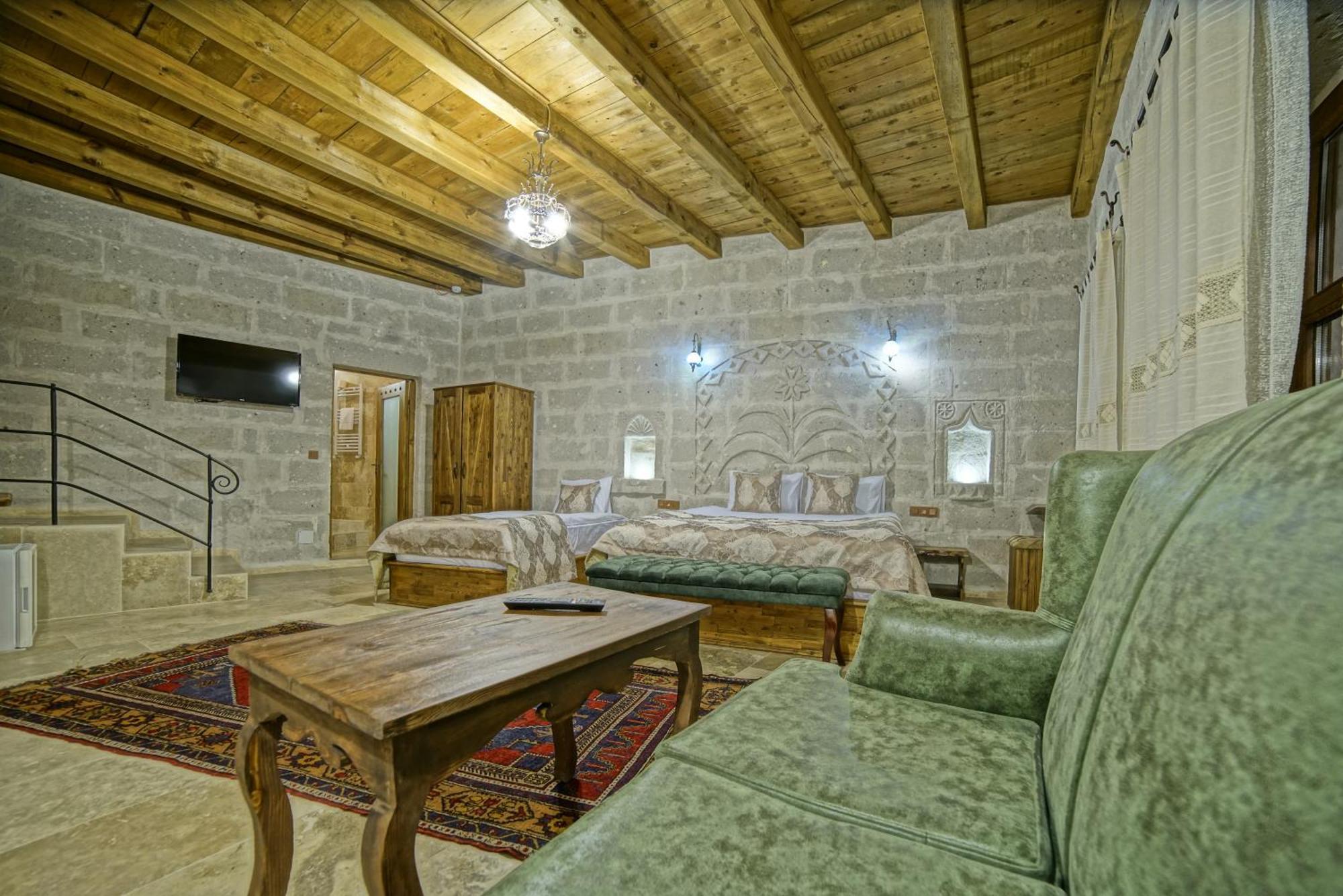 Risus Cave Suites Гьореме Екстериор снимка