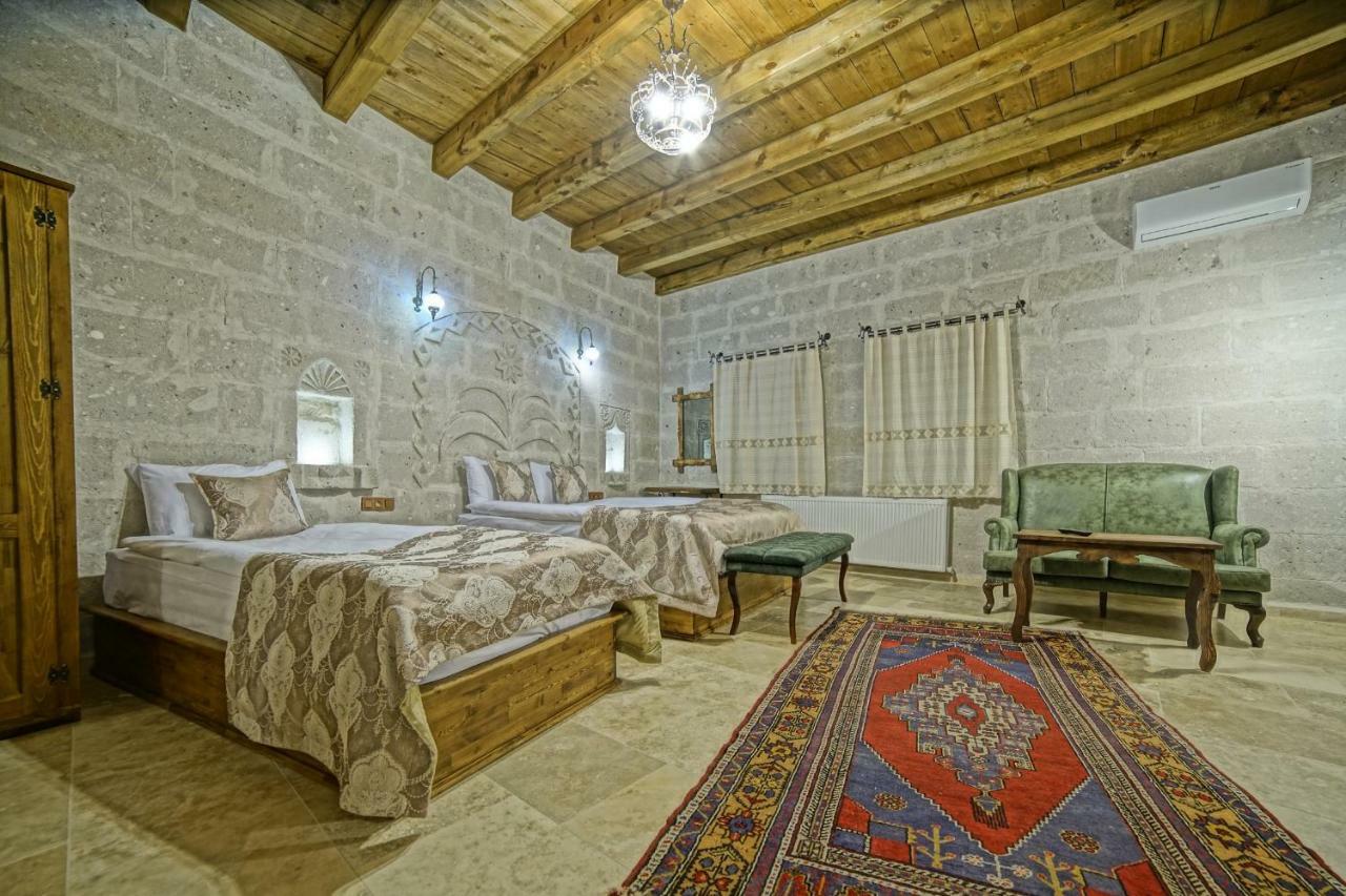Risus Cave Suites Гьореме Екстериор снимка