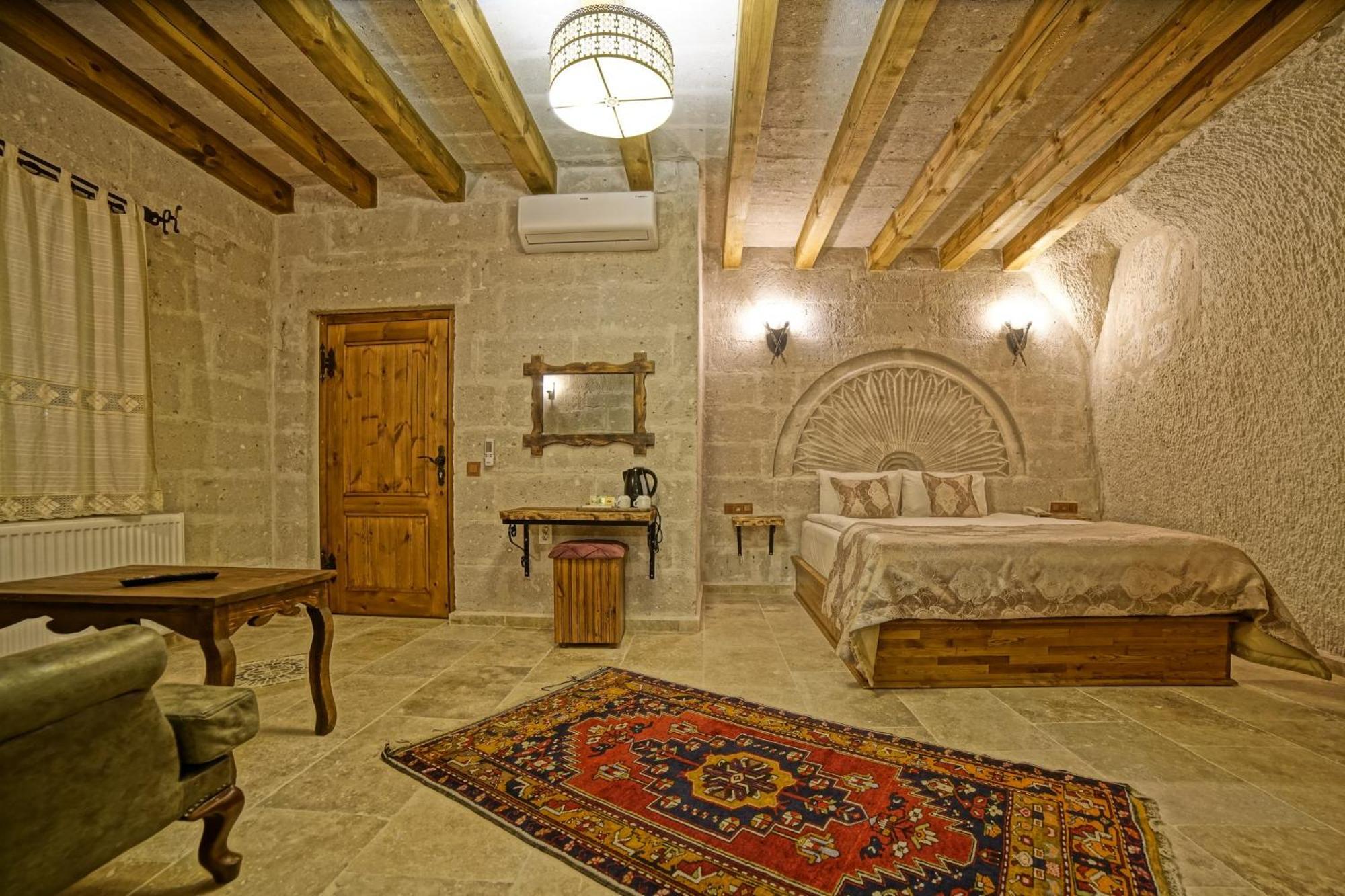 Risus Cave Suites Гьореме Екстериор снимка